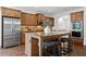Spacious kitchen featuring granite countertops, stainless steel appliances, and a convenient center island with seating at 771 Park Manor Se Dr, Smyrna, GA 30082