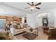 Bright and airy living room next to the kitchen, featuring hardwood floors and an open layout at 771 Park Manor Se Dr, Smyrna, GA 30082
