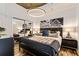 Stylish bedroom with a mirrored closet, chic lighting, and a comfortable bed with decorative pillows at 855 Peachtree St # 2901, Atlanta, GA 30308