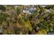 An aerial view shows mature trees surrounding the neighborhood at 1225 Westchester Ne Rdg, Atlanta, GA 30329