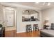 Inviting living room featuring a bar overlooking the kitchen and comfortable seating area at 1225 Westchester Ne Rdg, Atlanta, GA 30329