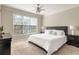 Comfortable main bedroom with a large window, plush carpeting, and neutral decor at 1225 Westchester Ne Rdg, Atlanta, GA 30329