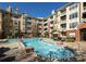Inviting swimming pool with brick trim and ample seating, set against a backdrop of an elegant apartment complex at 1225 Westchester Ne Rdg, Atlanta, GA 30329