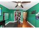This bedroom offers hardwood floors and a closet for ample storage space at 2375 Justine Ter, Lithia Springs, GA 30122
