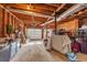 Spacious garage with overhead storage and ample room for parking and projects at 2375 Justine Ter, Lithia Springs, GA 30122