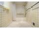 Full bathroom featuring a shower-tub combination with grab bars at 405 Putting Green Ln, Roswell, GA 30076