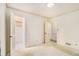 Bedroom featuring neutral walls and carpet and two access doors at 405 Putting Green Ln, Roswell, GA 30076