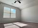 Well lit bedroom featuring a large window and plush carpeting at 1649 Auburn Ridge Way, Dacula, GA 30019