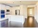 Spacious kitchen with white cabinets, granite countertops, and stainless steel appliances at 1649 Auburn Ridge Way, Dacula, GA 30019