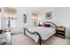 Bedroom featuring carpet, a bed with patterned bedding, and a double window at 606 Wedgewood Dr, Woodstock, GA 30189