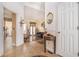 Inviting entryway showcasing tile flooring, decorative accents, and a view into the living room at 606 Wedgewood Dr, Woodstock, GA 30189