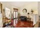 Comfortable living room with hardwood floors, neutral walls, and ample natural light at 606 Wedgewood Dr, Woodstock, GA 30189