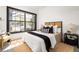 Bright bedroom with a large window, allowing ample natural light and features modern decor, creating a cozy atmosphere at 791 Wylie Se St # 105, Atlanta, GA 30316