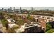 Brick apartment buildings with a skyline view, railroad track, and lush trees at 791 Wylie Se St # 105, Atlanta, GA 30316