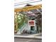 Modern building with yellow crane and stairs with an outdoor seating area at 791 Wylie Se St # 105, Atlanta, GA 30316