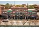 Beautiful brick building with balconies, manicured trees, and street views at 791 Wylie Se St # 105, Atlanta, GA 30316
