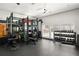 A well-equipped home gym featuring weights, mirror, and exercise equipment at 791 Wylie Se St # 105, Atlanta, GA 30316