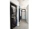 Modern laundry area featuring a stacked Samsung washer and dryer set, creating a compact and efficient space at 791 Wylie Se St # 105, Atlanta, GA 30316