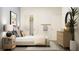 Comfortable bedroom with soft lighting, neutral colors, and ample closet space at 2443 Livi Ln, Buford, GA 30519