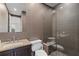 Sleek bathroom features modern tile, glass enclosed shower, and granite countertop on the vanity at 2934 Hermance Ne Dr, Atlanta, GA 30319