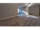 Spacious bedroom featuring neutral carpeting and bright, natural light at 136 Rainey Rd, Temple, GA 30179