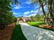Charming two-story home with an attached garage and a beautifully landscaped front yard at 136 Rainey Rd, Temple, GA 30179