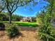 Charming two-story home with an attached garage and a beautifully landscaped front yard at 136 Rainey Rd, Temple, GA 30179