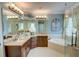 Beautiful bathroom with a soaking tub, glass shower, and granite countertops at 2000 Stethem Ferry Rd, Alpharetta, GA 30022