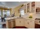 Well-equipped kitchen with granite counters, white cabinetry, and stainless steel appliances at 2000 Stethem Ferry Rd, Johns Creek, GA 30022