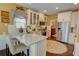 Beautiful kitchen with white cabinets, granite counters, and stainless steel appliances at 2000 Stethem Ferry Rd, Johns Creek, GA 30022