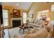 Bright living room with a fireplace and hardwood floors at 2000 Stethem Ferry Rd, Johns Creek, GA 30022
