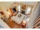 Upstairs view of the living room with a fireplace and multiple large windows for ample natural light at 2000 Stethem Ferry Rd, Johns Creek, GA 30022