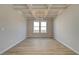 Dining room featuring modern light fixture, and wood flooring at 238 Arnewood Cir, Mcdonough, GA 30253