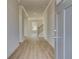 Inviting entryway featuring wood flooring, white trim, and an open floor plan at 238 Arnewood Cir, Mcdonough, GA 30253