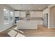 Beautiful kitchen with stainless steel appliances, light cabinets, and a large center island at 238 Arnewood Cir, Mcdonough, GA 30253