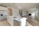 Open kitchen design with stainless steel appliances and seamless access to the living room at 238 Arnewood Cir, Mcdonough, GA 30253