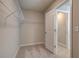 Walk-in closet offering shelving and open space, providing ample storage solutions at 238 Arnewood Cir, Mcdonough, GA 30253