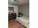 Bedroom with wood-style flooring, dresser and large mirror, and a queen-sized bed at 2760 Waterford Park Dr, Lawrenceville, GA 30044
