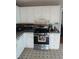 Kitchen featuring white cabinets and stainless steel appliances at 2760 Waterford Park Dr, Lawrenceville, GA 30044