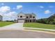 Beautiful two-story home featuring a manicured lawn, a two-car garage, and a brick and siding exterior at 127 Felicity Pike, Locust Grove, GA 30248