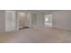 View of the laundry room with white cabinets and appliances at 127 Felicity Pike, Locust Grove, GA 30248