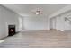 Spacious living room features hardwood floors, a fireplace, and abundant natural light at 127 Felicity Pike, Locust Grove, GA 30248