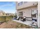 Backyard featuring a concrete patio, lawn, and chairs at 1741 Stanwood Dr, Kennesaw, GA 30152
