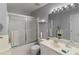 Clean bathroom featuring a shower and a sliding glass door at 1741 Stanwood Dr, Kennesaw, GA 30152