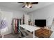 Bedroom featuring a ceiling fan, shelves, and an adjustable desk at 1741 Stanwood Dr, Kennesaw, GA 30152