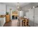 Cozy dining area featuring a stylish light fixture and seamless access to the patio at 1741 Stanwood Dr, Kennesaw, GA 30152