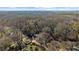 A sweeping aerial shot showing property situated in a mature neighborhood at 2183 Rhinehill Se Rd, Atlanta, GA 30315
