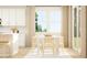 Bright dining area with white table set, complementing the kitchen's clean aesthetic and natural light at 2445 Livi Ln, Buford, GA 30519
