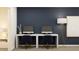 Dedicated home office with dual workstations against a navy wall, perfect for focused work at 2445 Livi Ln, Buford, GA 30519