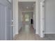 Inviting home foyer featuring luxury vinyl plank flooring and neutral paint at 237 Chiswick Loop, Stockbridge, GA 30281